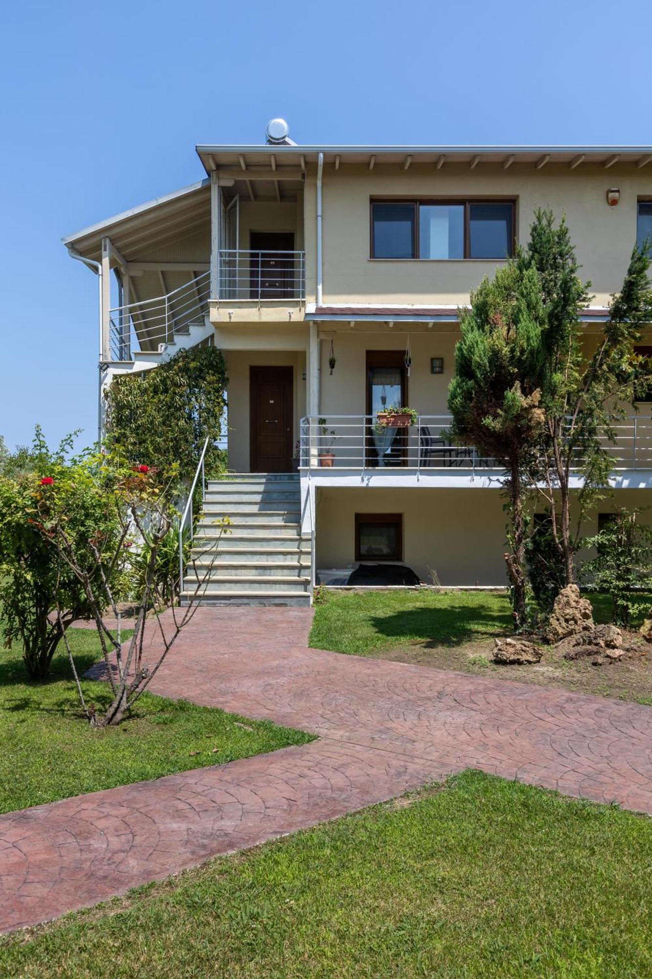 The Olympus Garden Beach House 里托楚伦 外观 照片